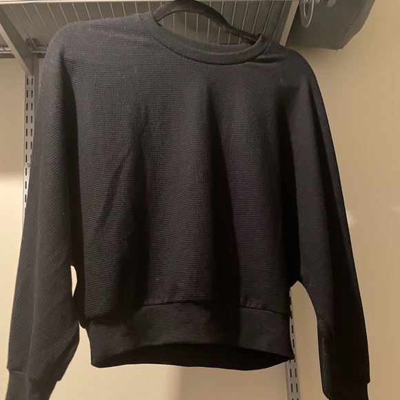 Black rib knit dolman sweater. - Picture 1 of 2